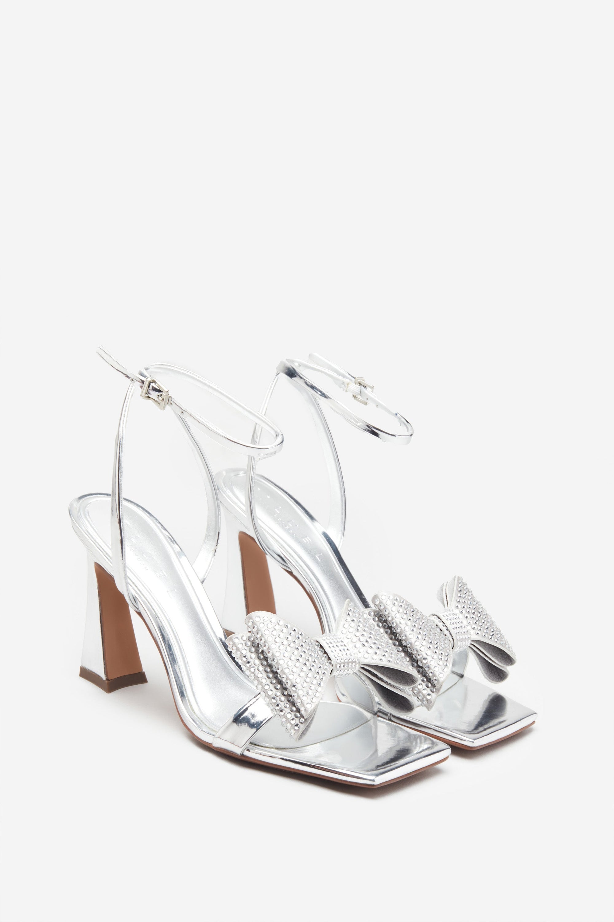 Headlines | Silver Ankle Strap Heeled Sandals With Diamante Bows - Club L 