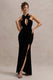 Mystery | Black Velvet Plunge Halter-Neck Split Maxi Dress With Bow - Club L 