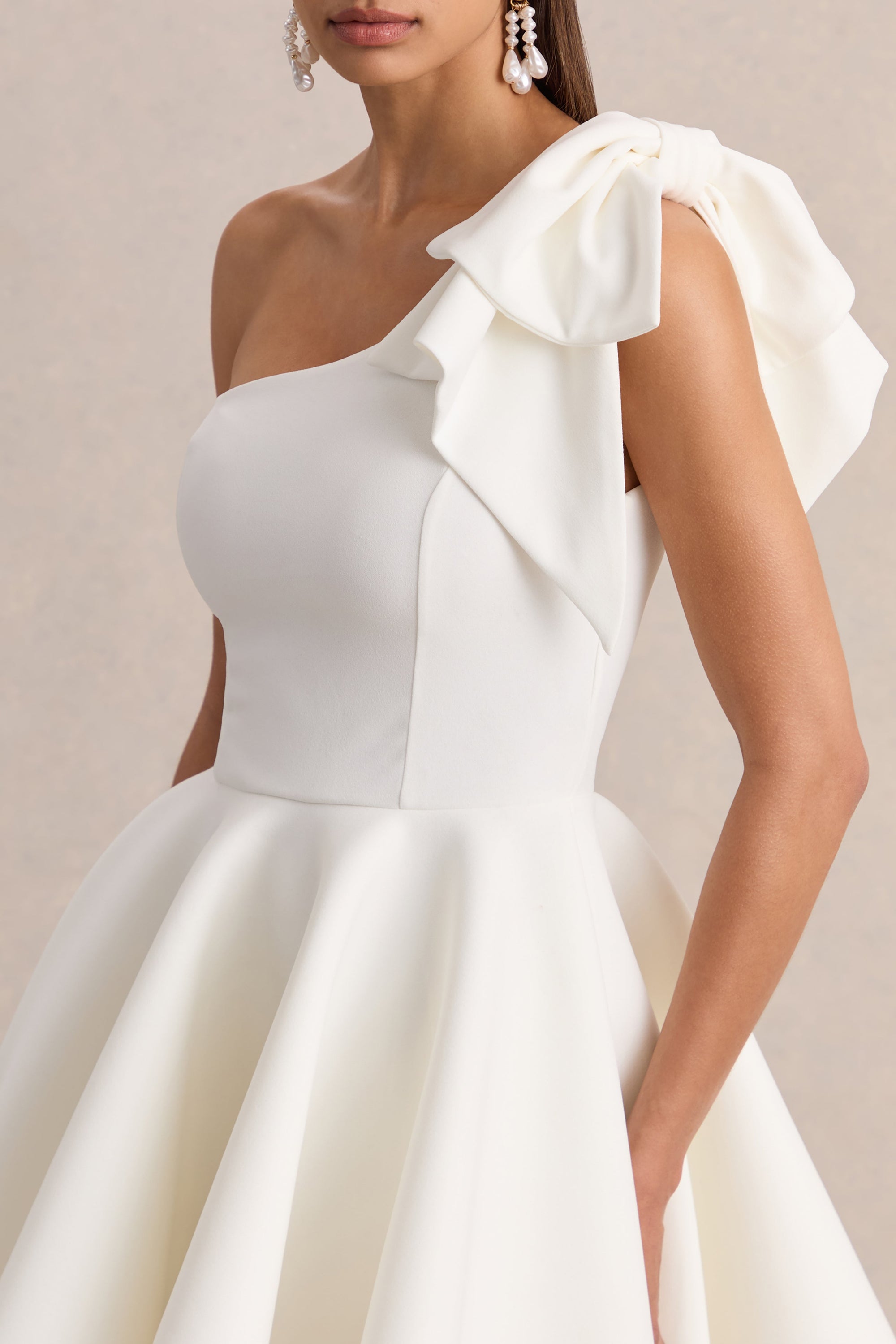 ECM_HR_CL136861110---Prosperity-_-White-Asymmetric-Neck-Mini-Dress-With-Bow-Detail-01.jpg