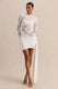 ECM_HR_CL137805110----Milavia---White-Lace-High-Neck-Mini-Dress-With-Wrap-&-Sash-Detail-1.jpg
